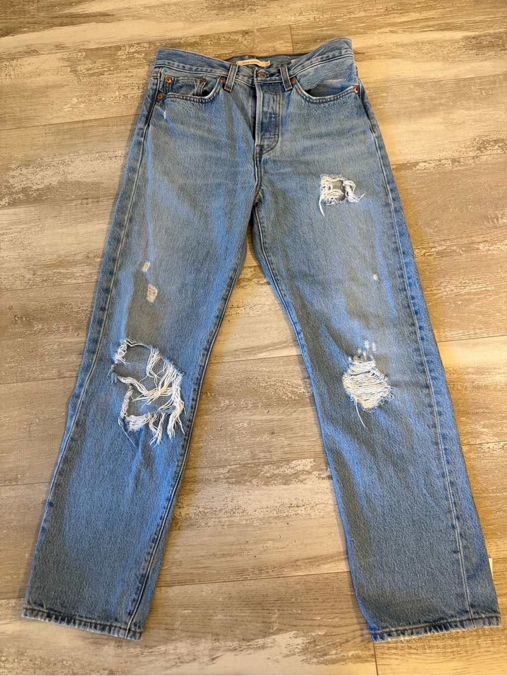 Levi's High-Rise Distressed Light Blue Jeans